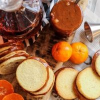 Keto Alfajores cookies on a brown cutting board