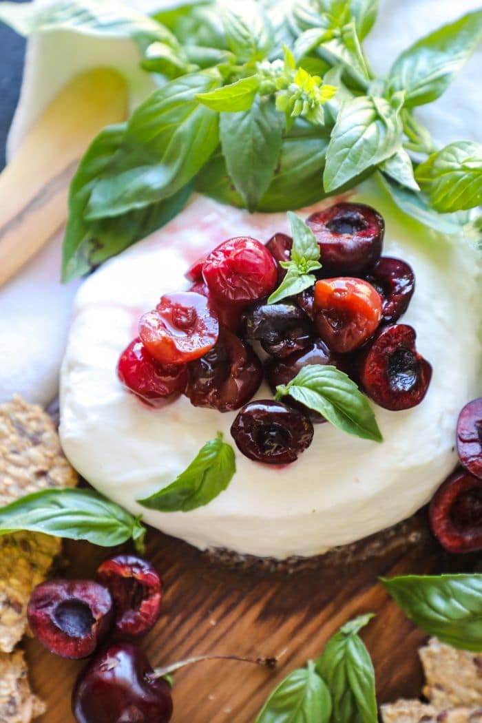 Cedar Plank Smoked Burrata with cherries and basil