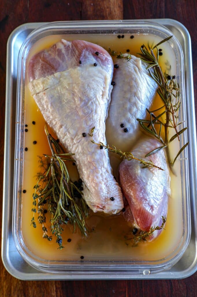 Raw Turkey Legs in apple cider brine